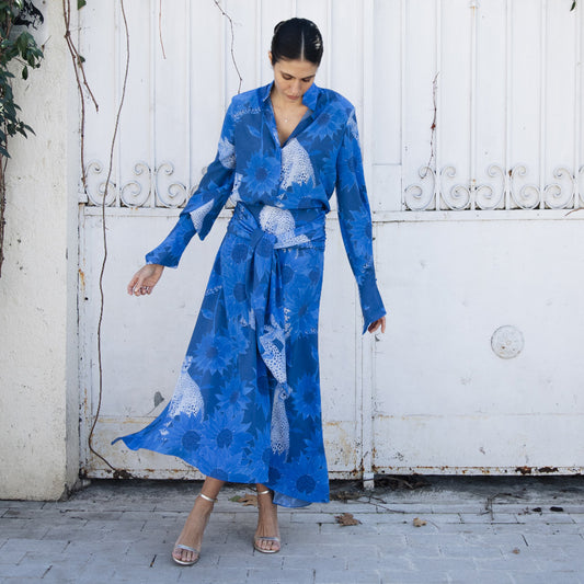 Luxury silk midi skirt; Elegant high-end fashion; Exclusive silk design; Timeless luxury skirt; Sophisticated silk apparel; Original hand-painted prints; Artistic silk fashion; Unique statement designs; Empowering luxury apparel; Vibrant designer pieces